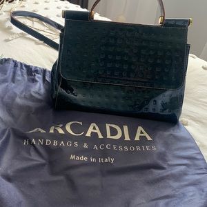 Arcadia signature embossed patent leather handbag